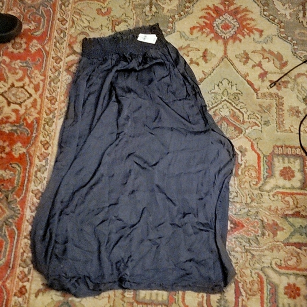 Brand new satin grey skirt with slit